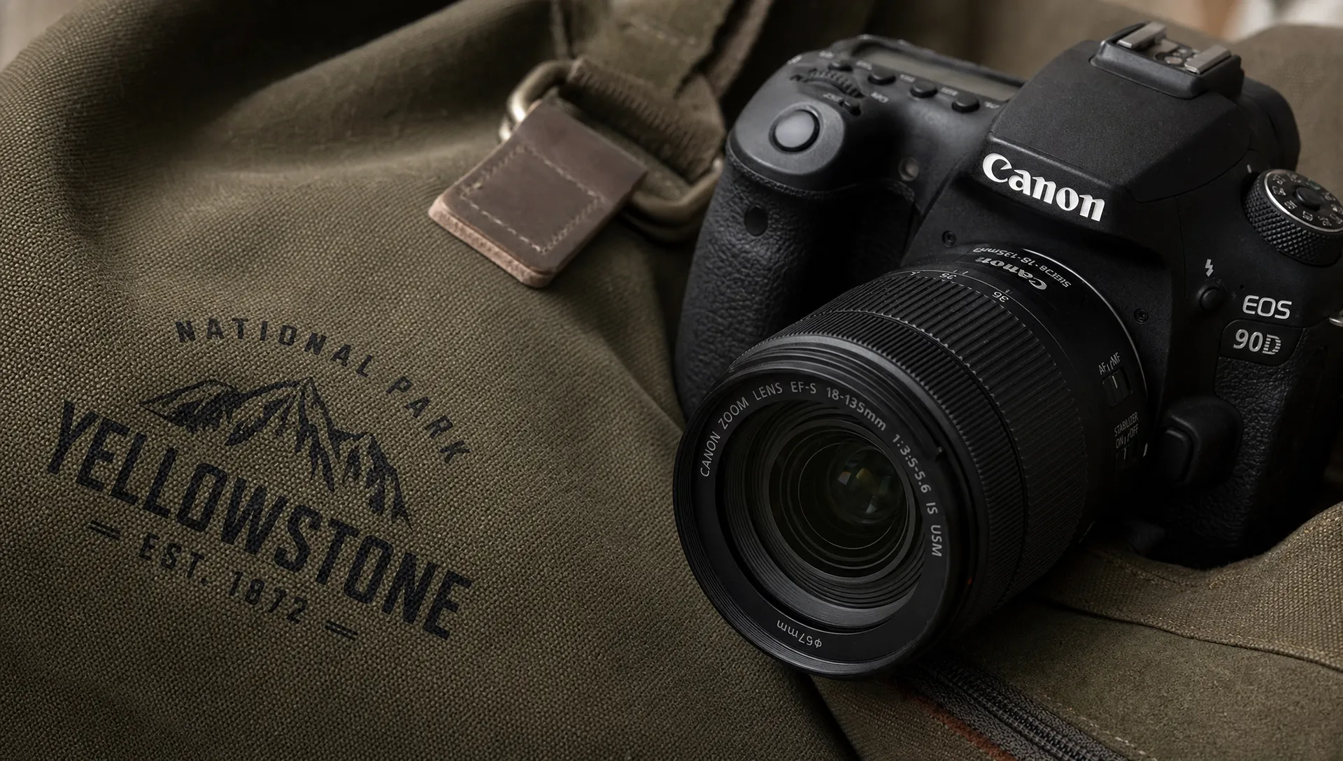 A close-up of a camera, fabric and printed text becoming clearer with sharper edges and finer texture.